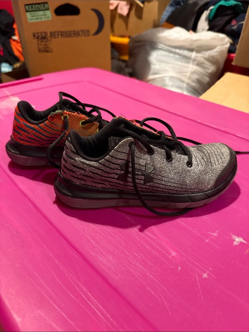 Under Armour Kids' Black and Gray Sneakers with Orange Accent